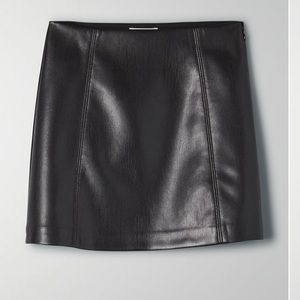 Babaton modern faux leather mini skirt